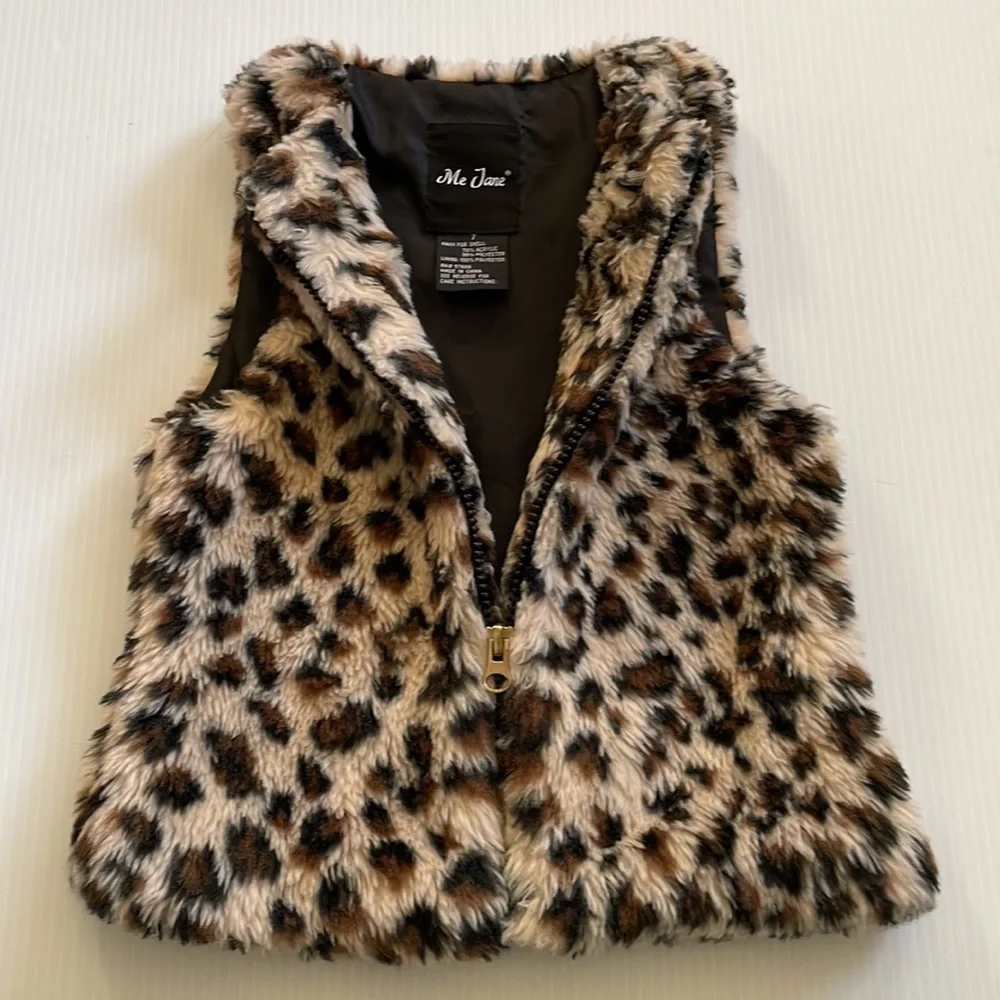 Me Jane black, brown & tan faux fur vest.  Girl’s size 7